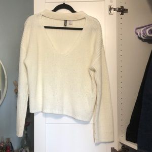 H&M white sweater. There are piles on the sweater.